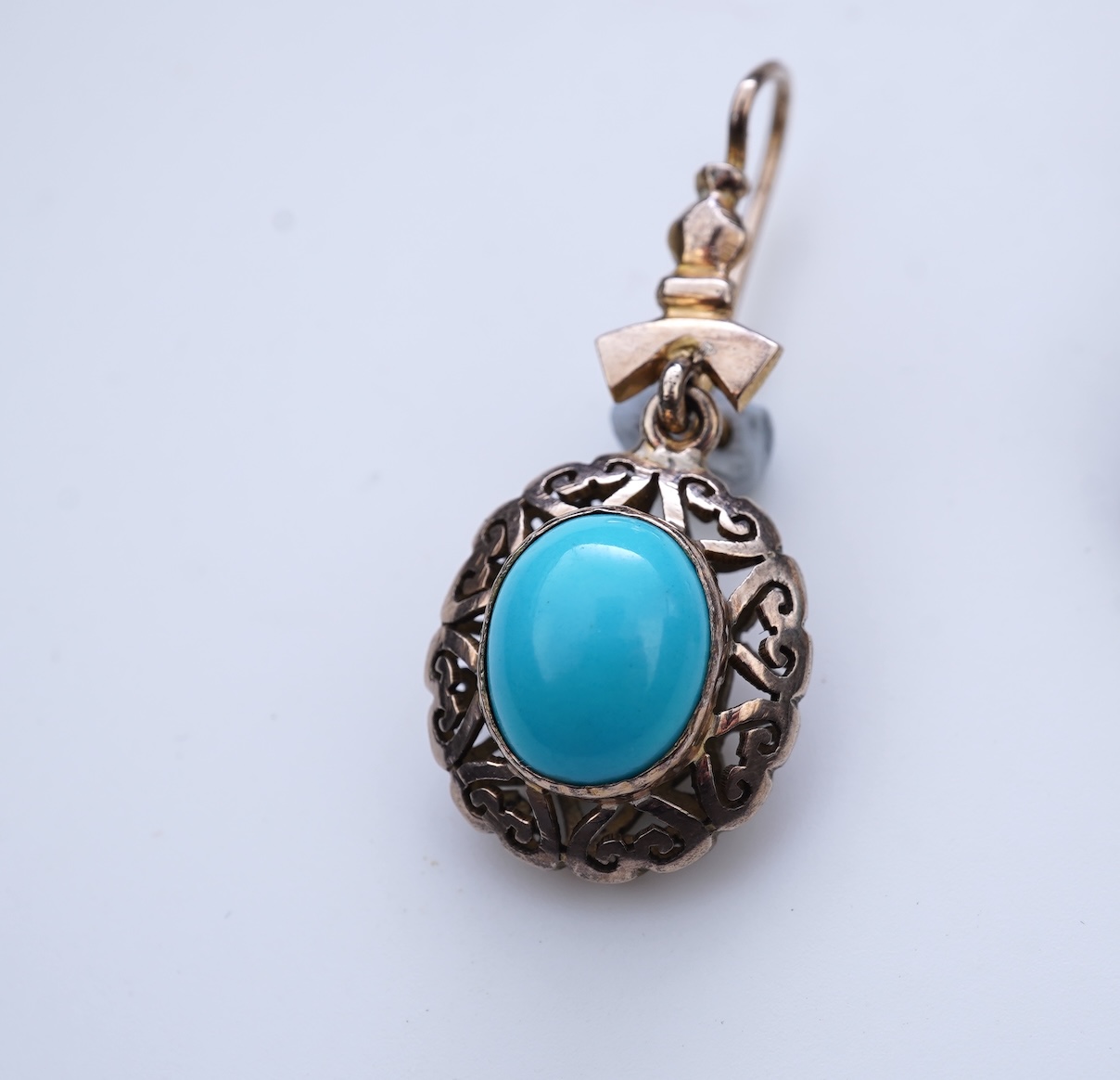 A pair of simulated turquoise earrings